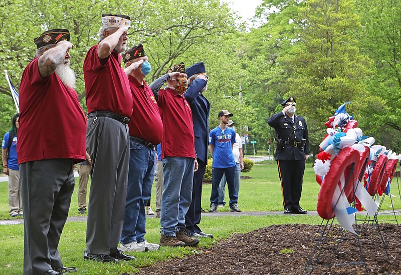 Members of the Lansdale VFW salute the fallen on Memorial Day. 