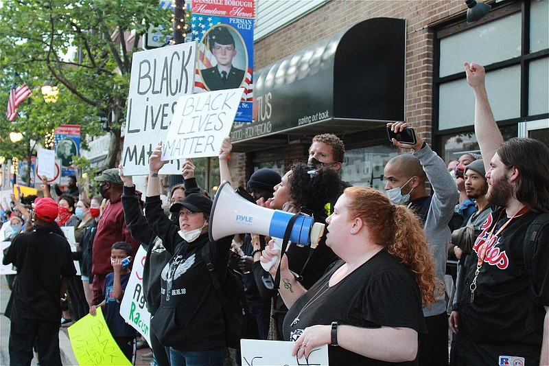 Protesters gather along West Main Street in Lansdale on June 2. 