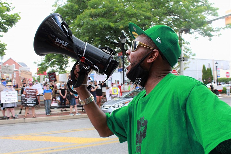 38-year-old Shaheer Johnson addresses the crowd at a rally in Lansdale on June 20. 