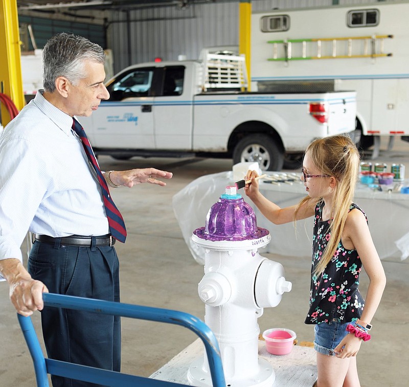 Anthony J. Bellitto, Jr., executive director of NPWA, left, and Cecelia Breen, contest winner, right. 