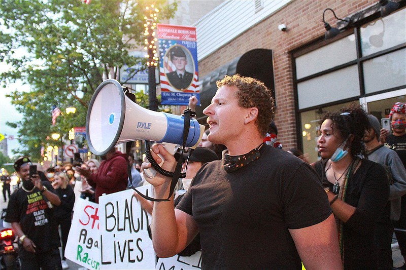 Rally organizer Josh Nielsen, of Lansdale, addresses demonstrators during Tuesday night’s rally. 