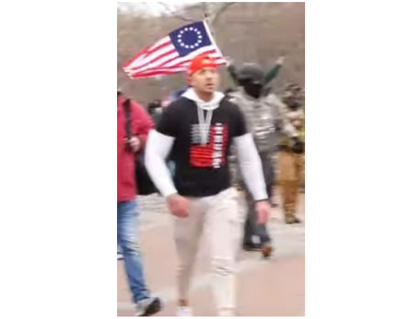 Ryan Samsel walking on the Capitol on January 6. 