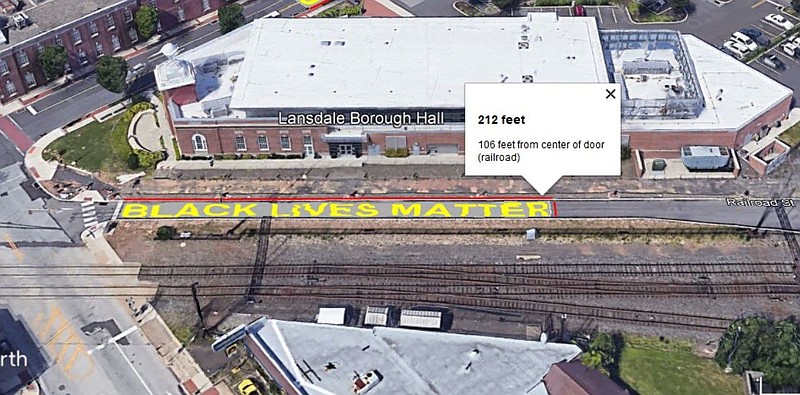 A concept rendering of the project, which would paint "Black Lives Matter" in large, yellow lettering across a portion of the Liberty Bell Trail paral