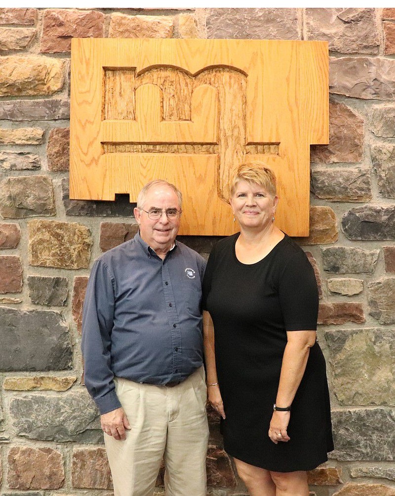 Carolyn McCreary, right, with current manager Larry Gregan, left. 