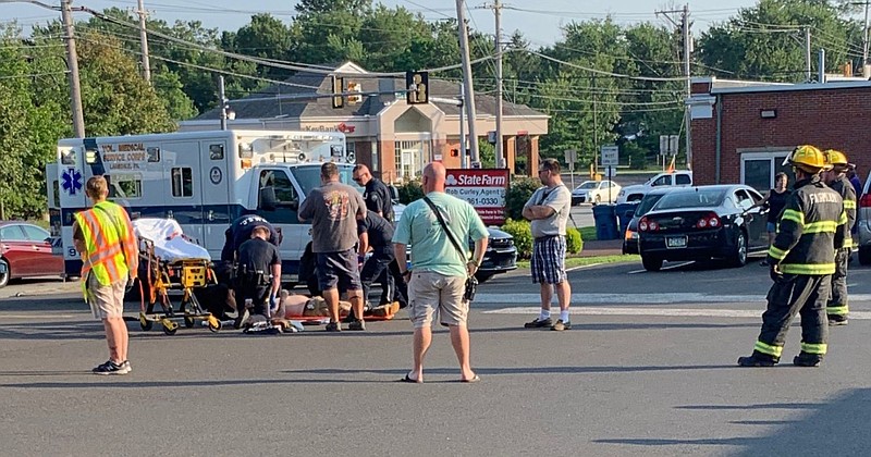 Medics administer Narcan to 32-year-old Jeffrey Tourdot at the scene of the crash. 