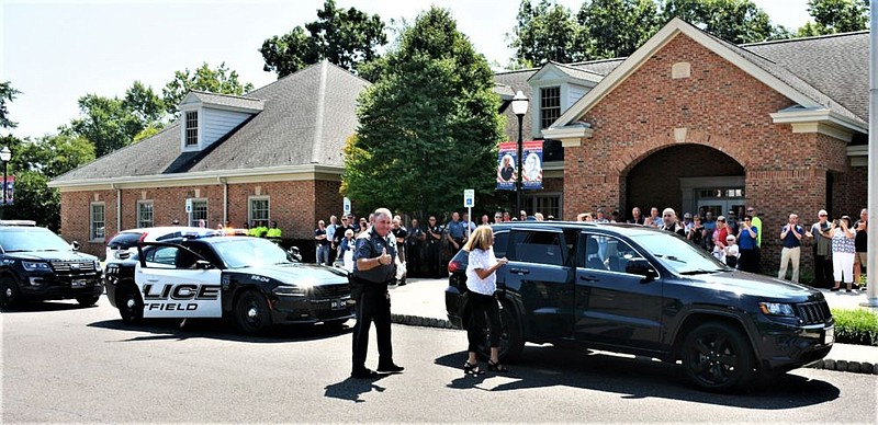 Corporal Patrick Hanrahan received quite a tribute during his final hours as a police officer on Friday. 