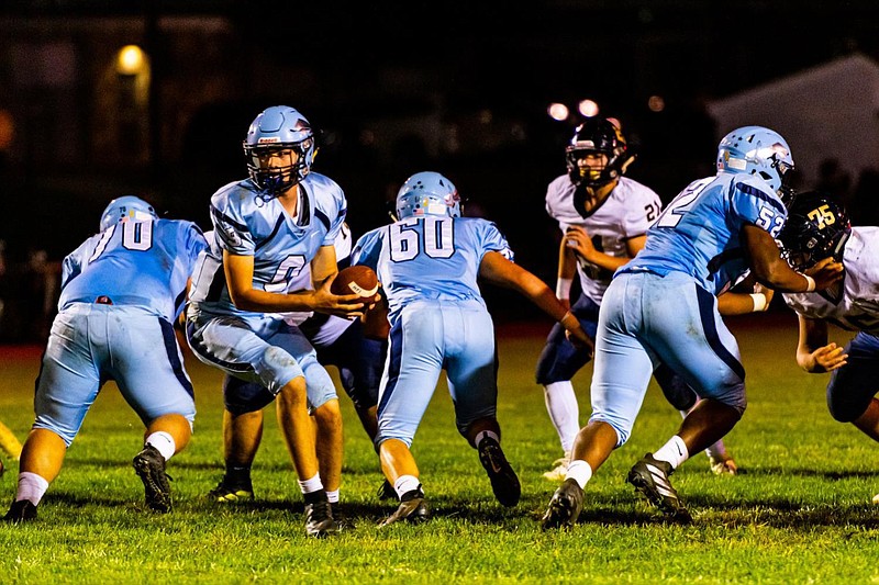 Quarterback Ryan Zeltt takes the snap before handing the ball off during a game against Council Rock on Sept. 27, 2019. 