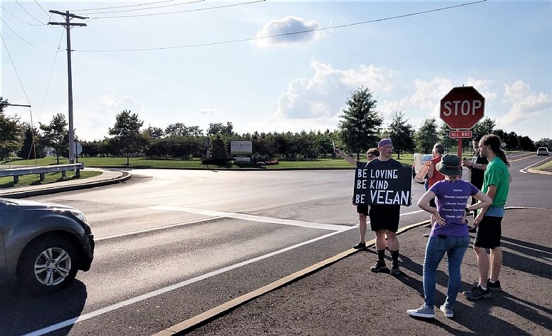 Protestors outside of Hatfield Quality Meats. 