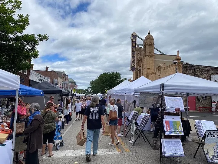 Attendees of this year’s Ambler Arts & Music Festival peruse through vendor tents posted along Butler Avenue this past weekend in downtown Ambler. (Photo courtesy Elizabeth Wahl Kunzier / Ambler Main Street)