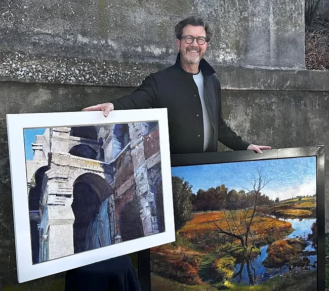 Artist Dale Roberts with one of his paintings. (Credit: Dale Roberts)