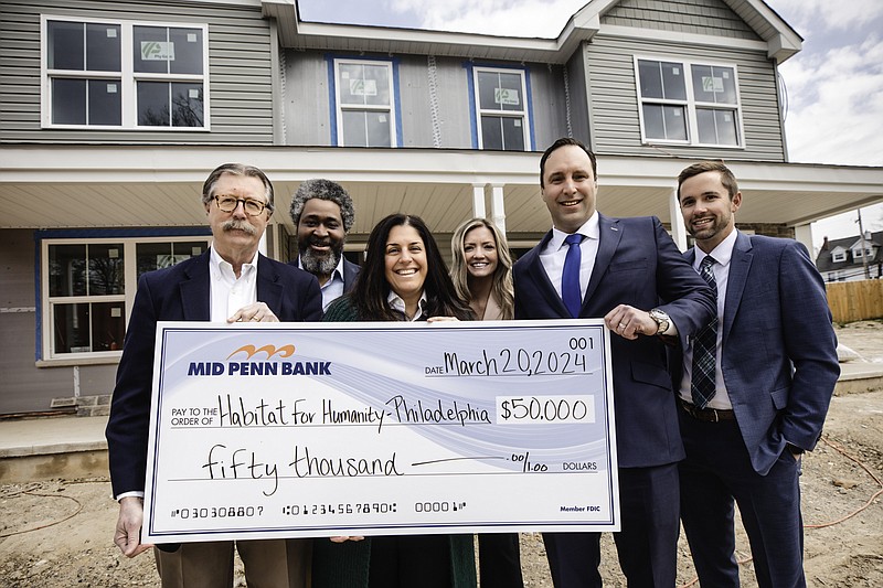 Habitat for Humanity of Montgomery and Delaware Counties CEO Keith Sterling, Habitat for Humanity MontDelco Board Member Christopher Glover, Mid Penn Bank Southeast Advisory Board Member Alessandra Nicolas, Mid Penn Bank Commercial Loan Manager Cindy Jacobsen, Regional President Jared Utz, and Mid Penn Bank Commercial Loan Manager Kevin Petzold. (Credit: Mid Penn Bank)