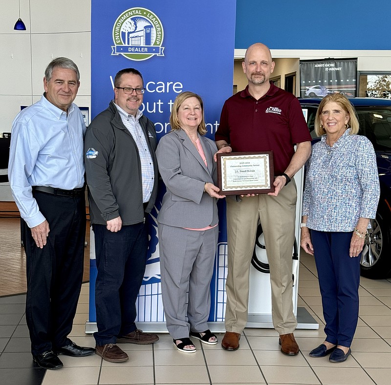 L-R: J.L. Freed Honda Owner Donald Franks, Express Service Manager Michael Sipes, NMTCC Administrative Director Gina Pardovich, Director of Fixed Operations Matthew Beatty, and J.L. Freed Honda owner Suzanne Franks. (Credit: Matthew Beatty/J.L. Freed Honda)