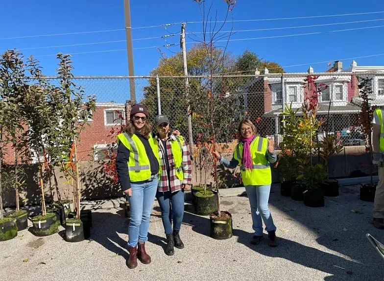 Caitlin Brady, Diana Lugo and Rosalba Esquivel Cote at a tree planting in Norristown last fall. (Credit: MediaNews Group / file photo)