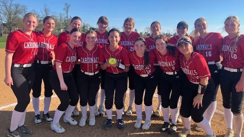 The Upper Dublin softball team poses for a photo after pitcher Kyla Garrison (holding ball) recorded her 300th career strikeout as she struck out 17 in throwing a no-hitter in a 5-0 victory over Abington on Tuesday, April 16, 2024. (Credit: Upper Dublin Softball)