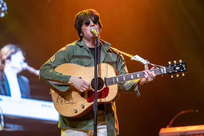 Lansdale native Steve Landes as Lennon with Rain. (Credit: Rain)