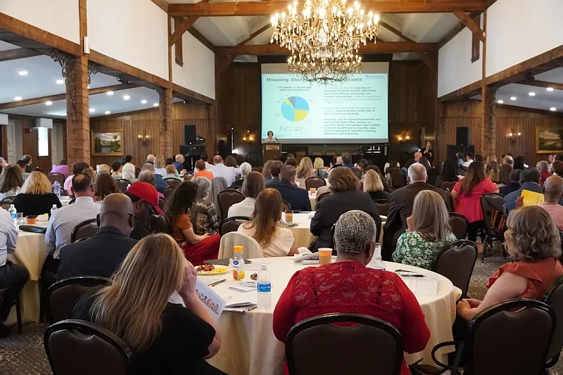 Attendees are pictured listening to Pennsylvania Human Services Secretary Dr. Val Arkoosh speak during a Montgomery County housing affordability summit on April 29, 2024 in Blue Bell. (Credit: Montgomery County PA)