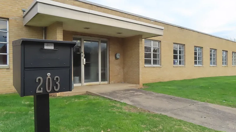 A mailbox reads “203” in front of a vacant former office building at 203 Church Road in Upper Gwynedd on Tuesday, April 9 2024.