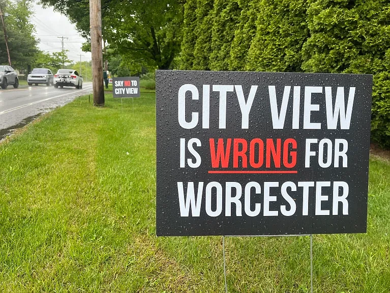 Signs are pictured along Valley Forge Road opposing a proposed development project in Worcester Township.