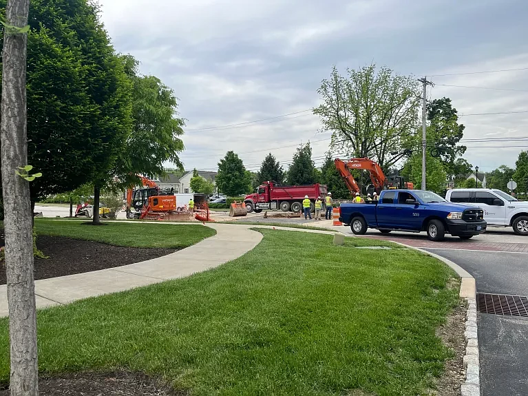 Crews survey an excavated area of Plymouth Road as both lanes are closed due to a sinkhole. (Credit: Rachel Ravina / MediaNews Group)