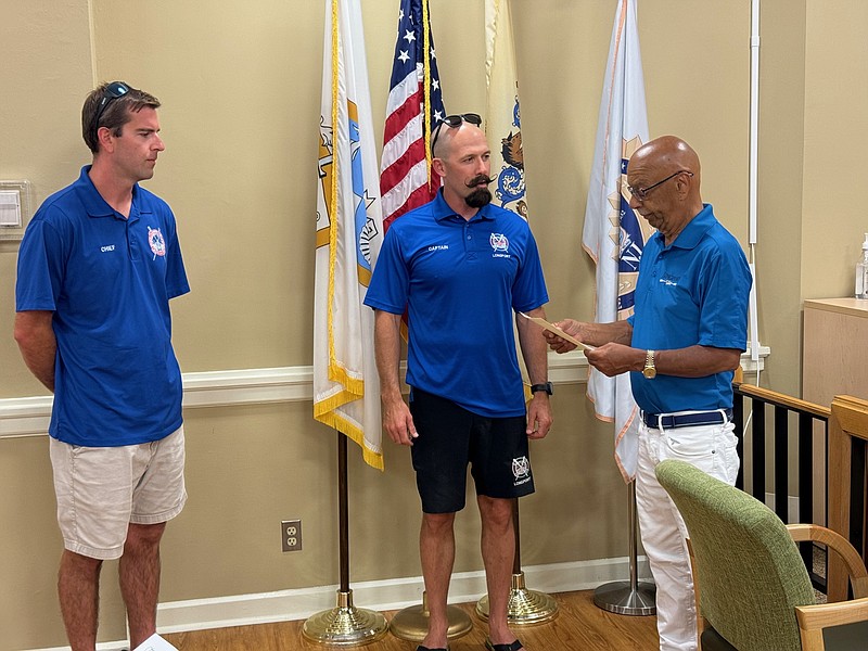 Lt. Eric Grimley, center, is promoted to the rank of captain, June 19, 2024. Also pictured is Longport Beach Patrol Chief Tom Kresz and Mayor Nicholas Russo.