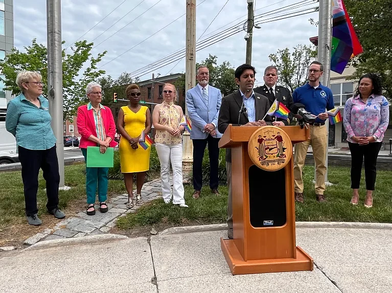 Montgomery County Commissioners’ Vice Chairman Neil Makhija is pictured holding a Pride flag as he speaks on June 3, 2024 during a Montgomery County Pride flag raising ceremony outside the courthouse in Norristown. (Credit: Rachel Ravina / MediaNews Group)