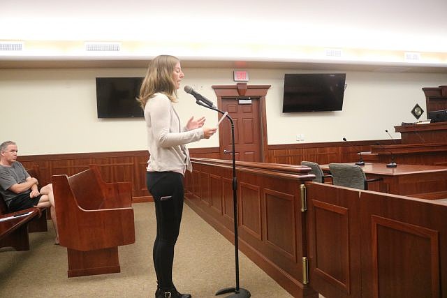 Caitlin Haffert, a psychic medium, urges City Council to rescind the "anti-fortune telling ordinance."