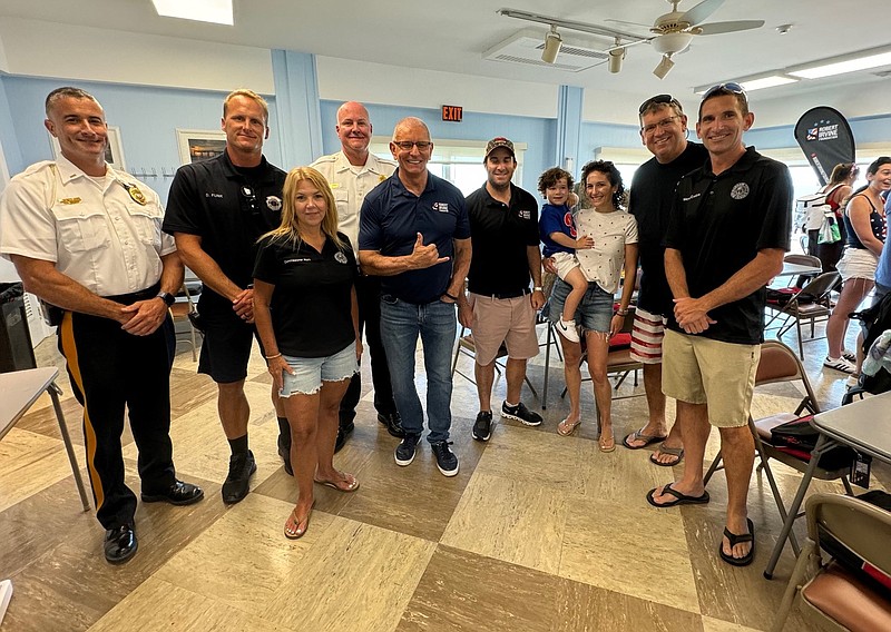 Celebrity Chef Robert Irvine gives a thumbs up to the Margate first responders who saved the life of the 3-year-old son of one of his foundation board members.