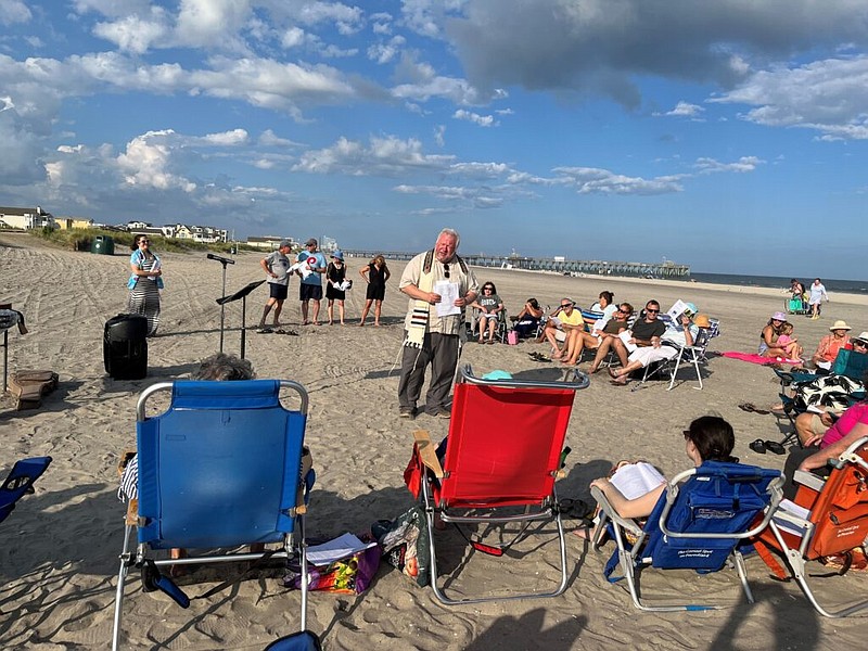 Beth Israel Rabbi Michael Feshbach leads shabbat services on the beach in Margate.