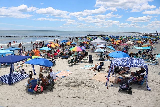 This photo, taken on a sunny day in July, showcases the popularity of Ocean City's beachfront.