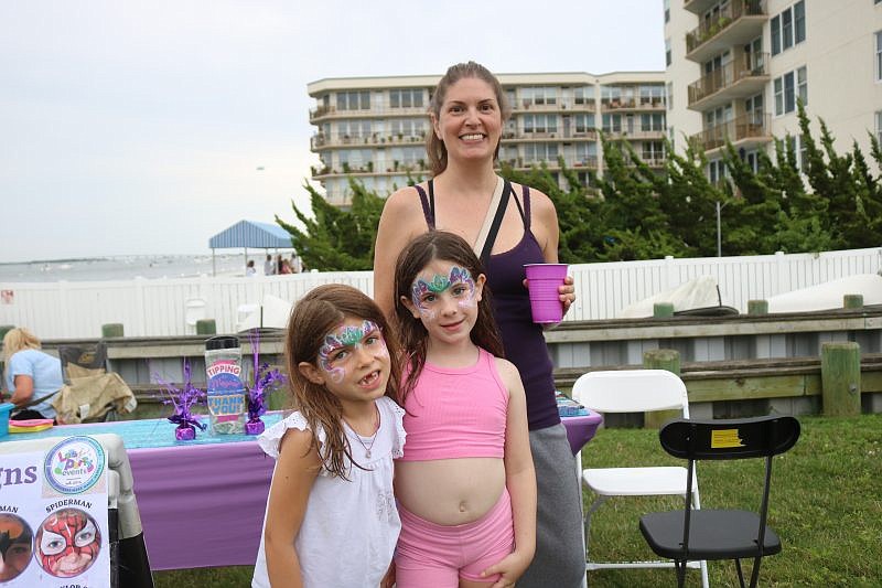 Bethany Bresacher and her daughter, Alex, of Chester County, Pa., and friend, Victoria Selby, of Ocean City, have fun at the Bayside Center.