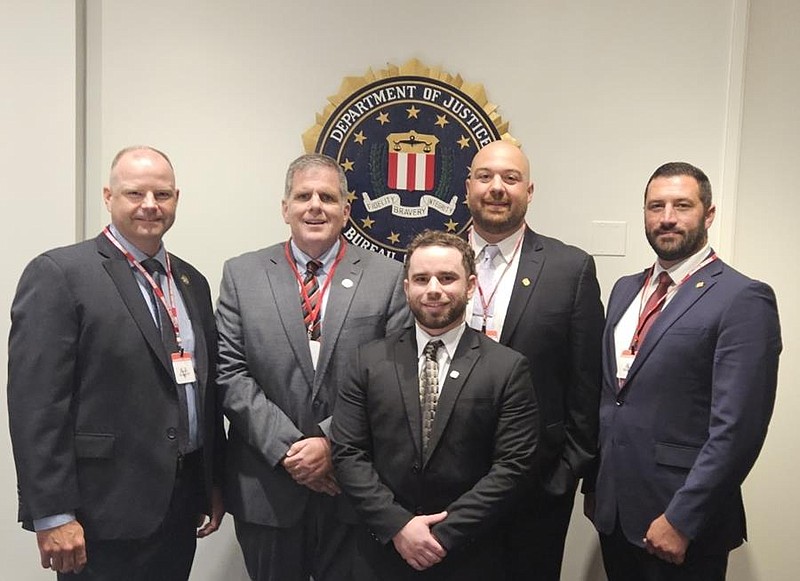 (From left) Chief Deputy Adam Berry, Sheriff Sean Kilkenny, Deputy Zachary DeSanto, Corporal Timothy Metz and Corporal Andrew Noto.