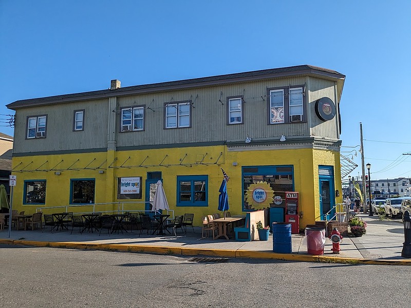 The Bright Spot Cafe in its yellow color scheme overlooks the Landis Avenue downtown corridor. (Photo courtesy of Facebook)