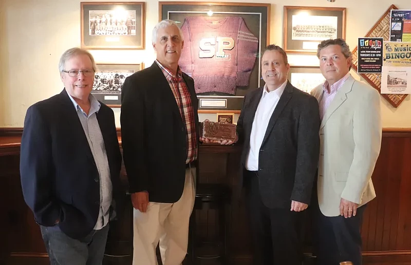 The Perk owner Larry Nacarella was named as one of the first recipients of the Jim Purcell Memorial Award. From left to right: Perkasie council member Scott Bomboy, Perkasie mayor Jeff Hollenbach, Nacarella, Perkasie council president Jim Ryder.