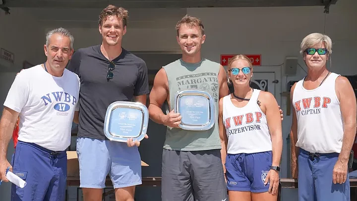 Second from left, is former Ventnor City Beach Patrol member Doug Davis and next to him is Brett Hanson, who are rowing around Absecon Island to raise money for the VCBP Alert Team.