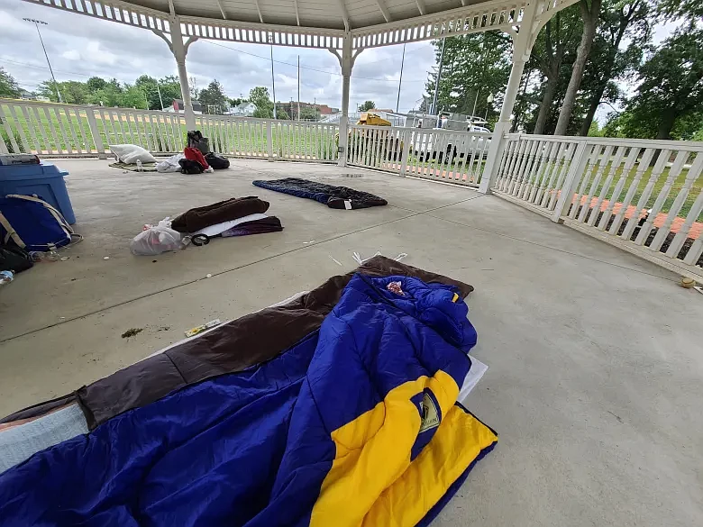 Sleeping bags and belongings of men living inside the gazebo at Memorial Park in Lansdale are seen on Tuesday, July 23 2024.