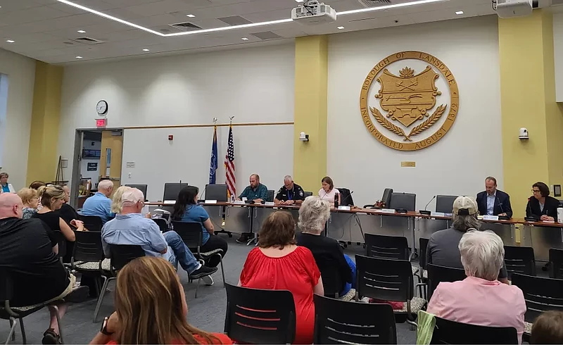 Lansdale’s mental health coresponder Alexis Moyer, seated front right, and council’s public safety committee speak during a discussion on homelessness on Wednesday, Aug. 7, 2024.