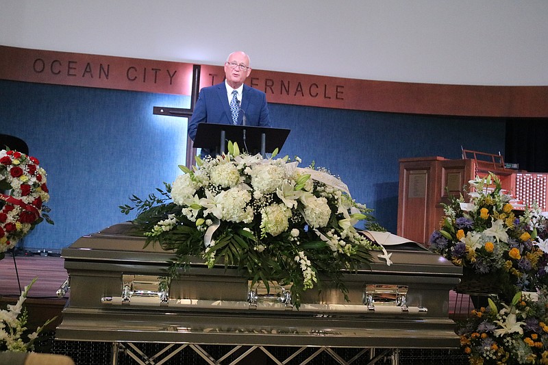 Ocean City Tabernacle Rev. Jim Carroll eulogizes Roy Gillian while standing behind his coffin.