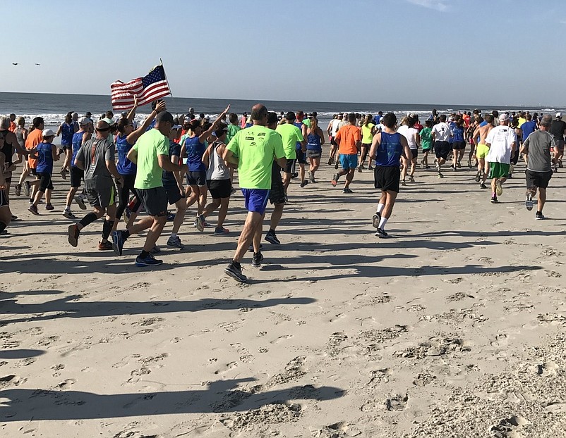 Start Labor Day off right with a run on the beach in Ocean City. (Photo courtesy of Ocean City)