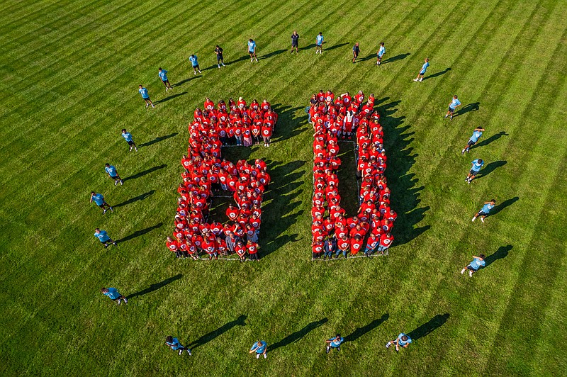 More than 350 students, employees, alumni and community members at Montgomery County Community College assembled at Blue Bell Campus to form a ‘Human 60’ to commemorate the College’s 60th anniversary. (Photo by Nick Savino/NGS Productions)