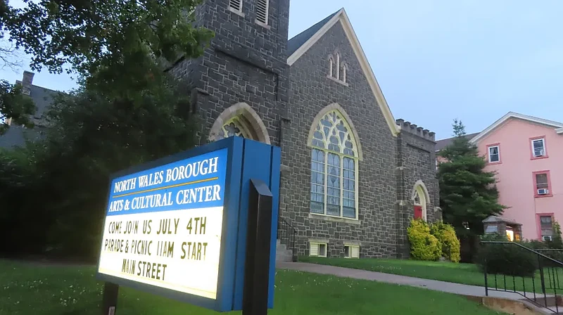 An illuminated message sign stands in front of the borough-owned former church at 125 N. Main Street in North Wales on June 28, 2023.