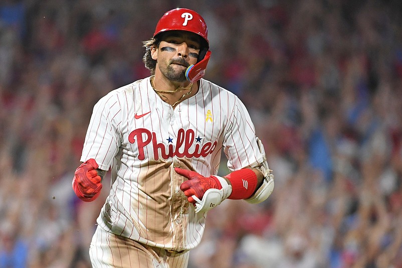 Sep 1, 2024; Philadelphia, Pennsylvania, USA;  Philadelphia Phillies outfielder Nick Castellanos (8) celebrates his walk-off single during the eleventh inning against the Atlanta Braves at Citizens Bank Park. Mandatory Credit: Eric Hartline-USA TODAY Sports