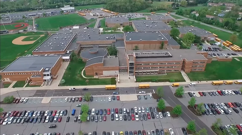 Aerial photo of North Penn High School, center, with district transportation garage at top center, North Montco Technical Career Center at top left, and former WNPV Radio site at top right, as seen in NPTV video “NPHS – A Building By Community.”