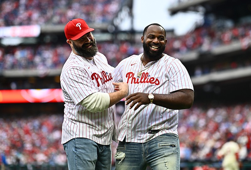 Mar 30, 2024; Philadelphia, Pennsylvania, USA; Former Philadelphia Eagles Jason Kelce and Fletcher Cox react after throwing the first pitch before the game between the Philadelphia Phillies and Atlanta Braves at Citizens Bank Park. Mandatory Credit: Kyle Ross-USA TODAY Sports