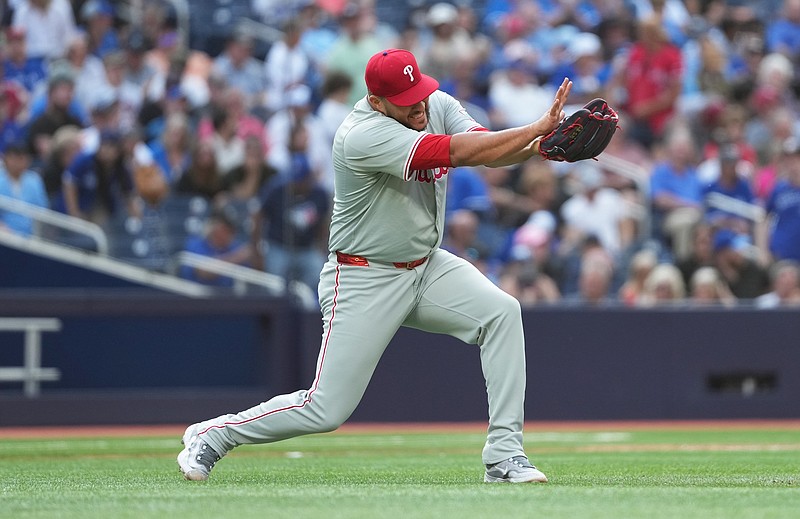 Sep 4, 2024; Toronto, Ontario, CAN; Philadelphia Phillies relief pitcher Carlos Estevez (53) celebrates the win against the Toronto Blue Jays at the end of the ninth inning at Rogers Centre. Mandatory Credit: Nick Turchiaro-Imagn Images