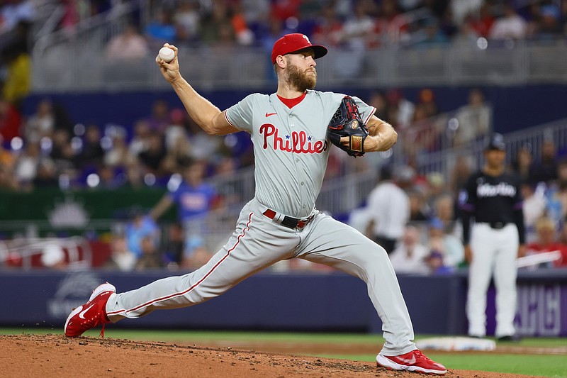 Sep 6, 2024; Miami, Florida, USA; Philadelphia Phillies starting pitcher Zack Wheeler (45) delivers a pitch against the Miami Marlins during the second inning at loanDepot Park. Mandatory Credit: Sam Navarro-Imagn Images