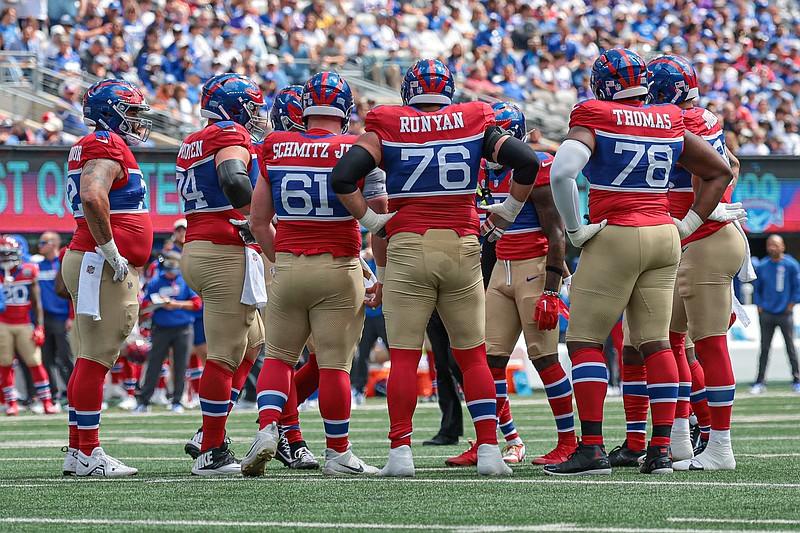 Sep 8, 2024; East Rutherford, New Jersey, USA; New York Giants offensive linemen huddle during the first quarter against the Minnesota Vikings at MetLife Stadium. Mandatory Credit: Vincent Carchietta-Imagn Images