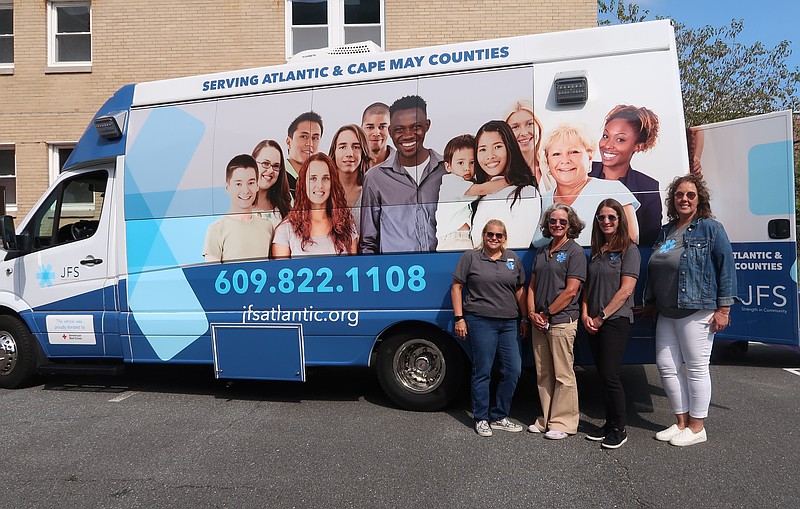 Jewish Family Service of Atlantic and Cape May Counties agency leaders, from left, Beth Joseph, Ann Thoresen, Andrea Steinberg and Christina Swank, showcase the retro-fitted sprinter van donated by the American Red Cross as part of its Community Adaption Program. The custom-designed van provides JFS with the opportunity to reach people in need in saturated urban areas, such as Atlantic City and the county’s rural locations, as part of a partnership to build more resilient communities.