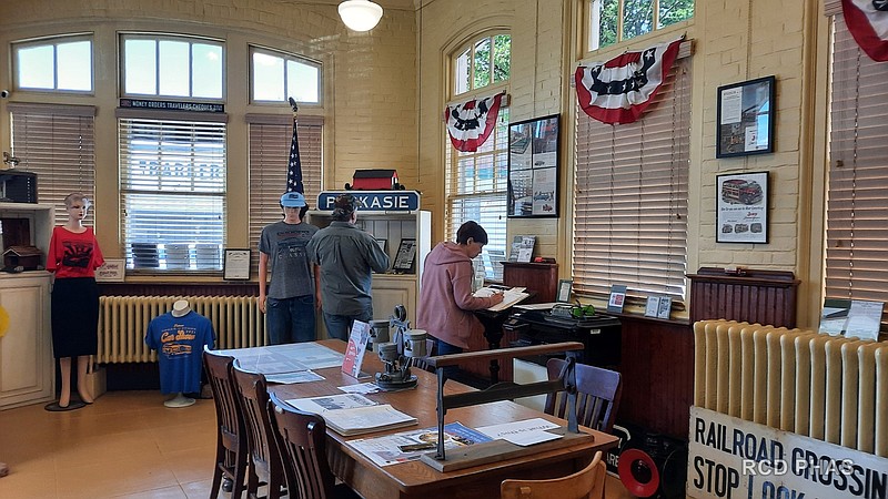 Visitors enjoy the museum display.