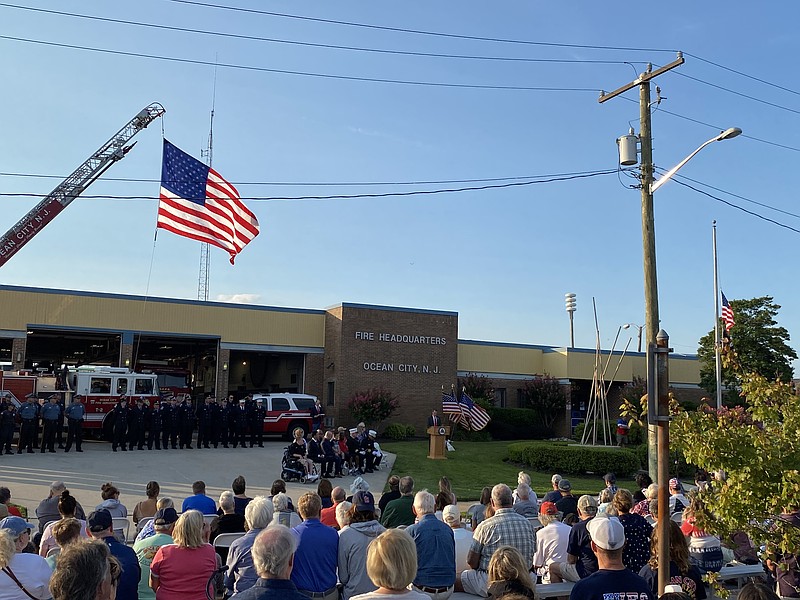 A large American flag flies above Ocean City's 9/11 remembrance ceremony in 2023. (Photo courtesy of Ocean City)