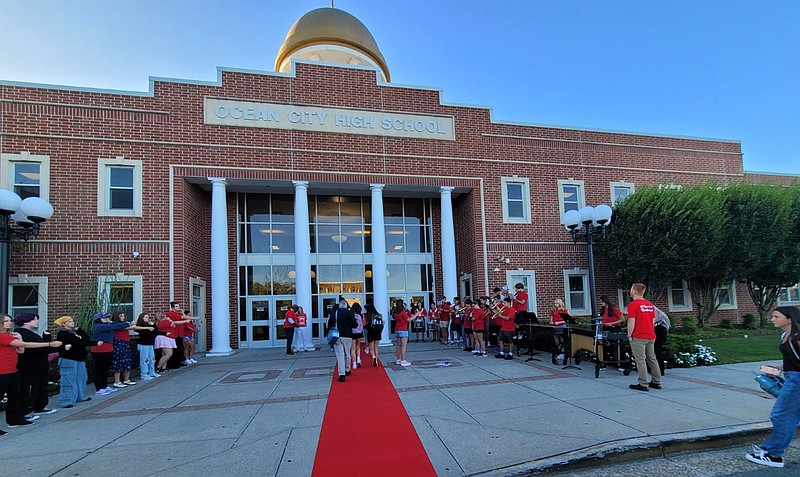 Students walk on the red carpet on the first day of school while welcomed by applause and music from administrators and the OCHS band. (Photo courtesy of Ocean City school district)